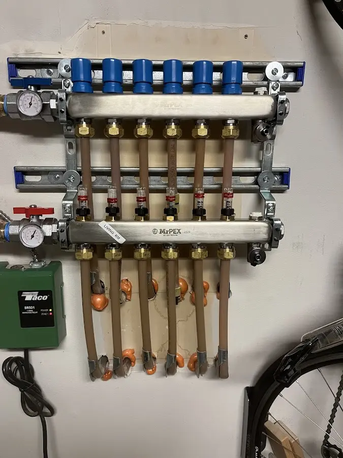 Plumber performing Gas Line Installation at a residential property in Beekmantown